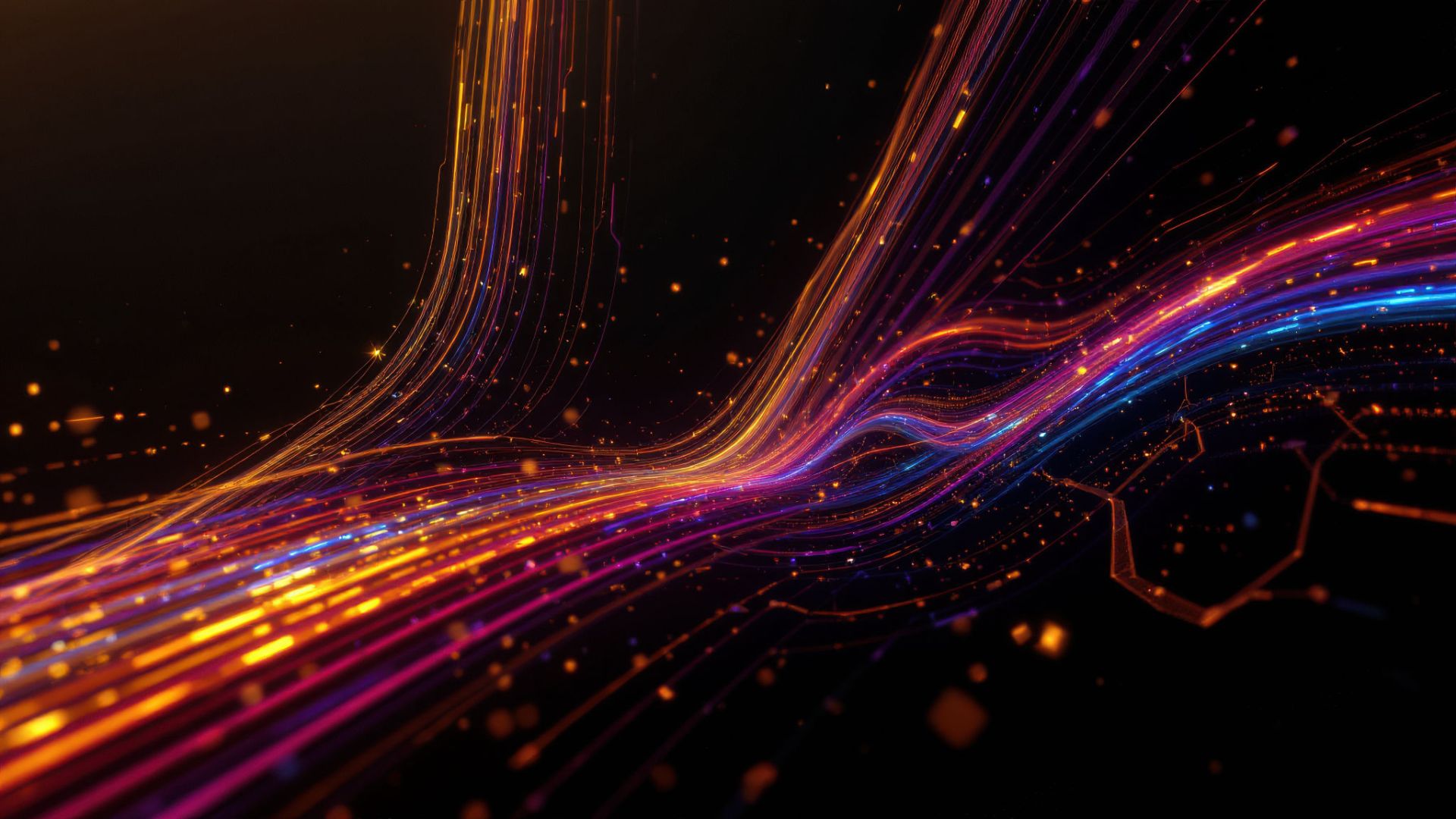 Colorful light trails of orange, pink, and blue weave dynamically across dark background